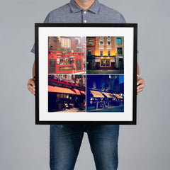 A man holds a black-framed photo print with a white mat. The print features a 2x2 collage photo grid of famous Dublin pubs. The print is 40x40cm and the frame is 54x54cm.  