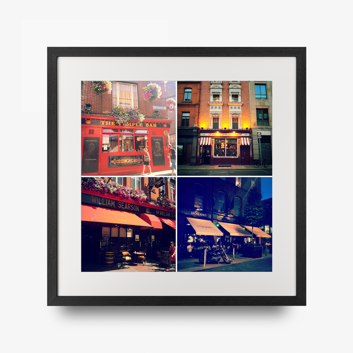A custom square framed grid of four photos arranged inside a black square frame. 